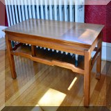 F62. Teak coffee table. 16”h x 34”w x 16”d - $48 